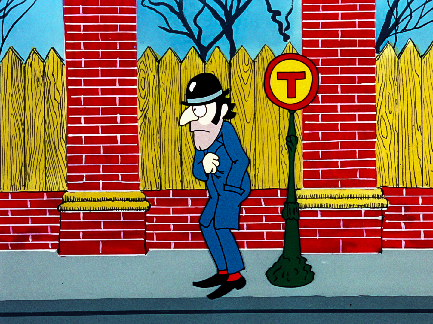 a shady man standing by a tram stop