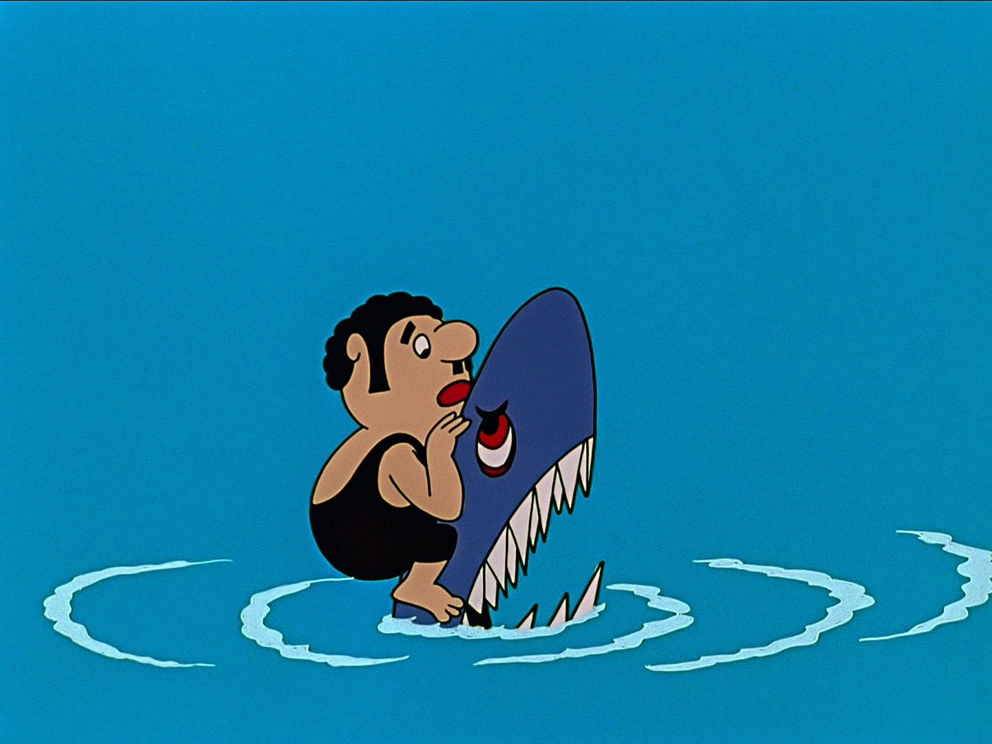 cook bartolini sitting on a head of an angry shark, in water cook bartolini sitting on a head of an angry shark, in water